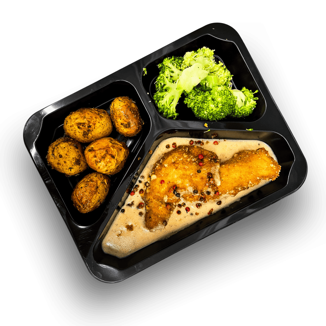 Udziec z indyka w sosie z czerwonego pieprzu, ziemniaki opiekane, brokuł blanszowany