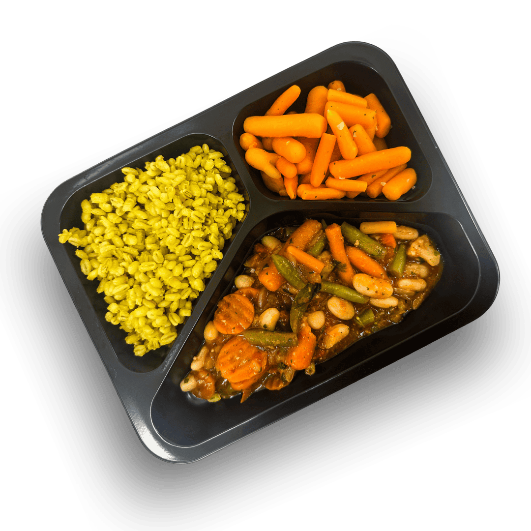 Warzywny gulasz z białą fasolą, marchew baby